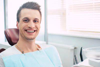 man smiling during his smile makeover appointment at Pacific Coast Dentistry in Paso Robles, CA
