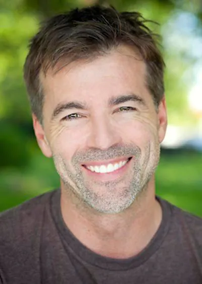 man smiling after getting a dental checkup at Pacific Coast Dentistry